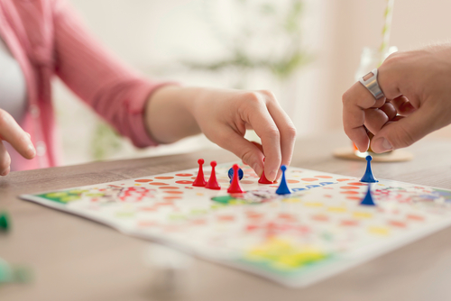 A board game can distract and alleviate side effects and taking more HHC.