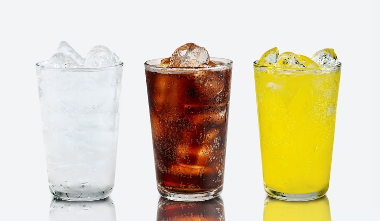 Three types of non-alcoholic drink in a glass with ice to help with HHC side effects such as dry mouth