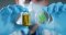 A researcher holds a bottle of THCJD and a cannabis leaf in a glass