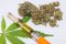 Vaporizing pen with distillate containing HHCO, cannabis flowers HHCP and cannabis leaf